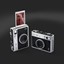 211004 Instax mini Evo Feature Shot 10 Camera both angles_comp Black BG_retouch_300dpi_2000px.jpg
